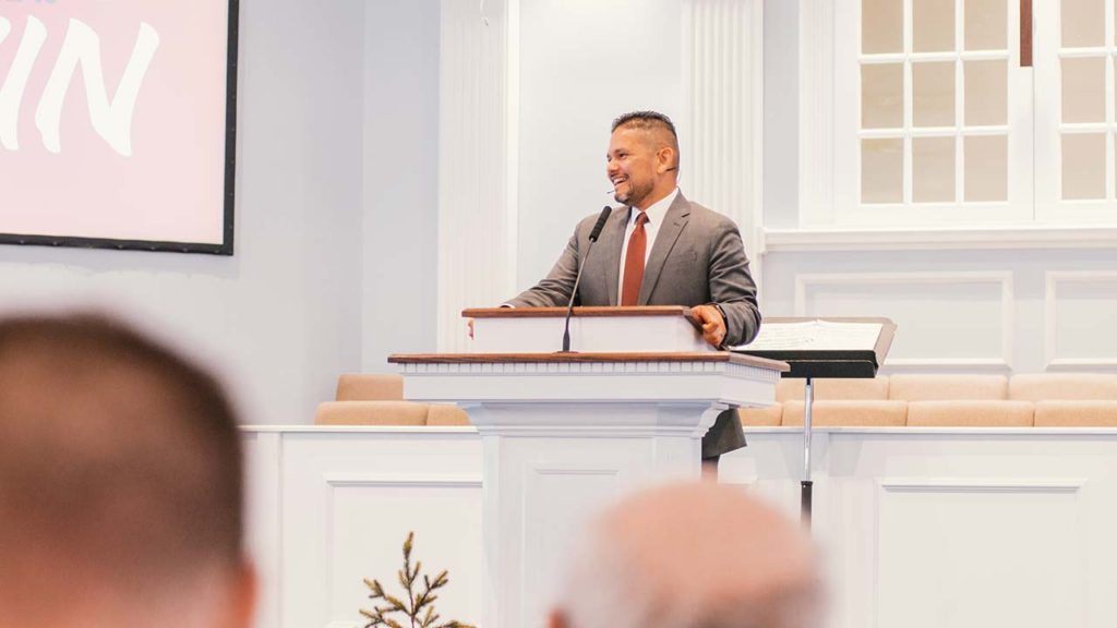 Pastor Carlos Navarrete preaching in Rhode Island